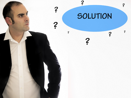 Business man trying to find a solution to a problem.の写真素材