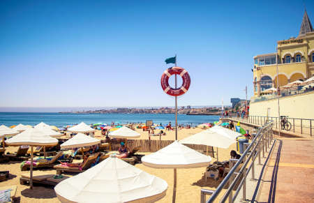 LISBON, PORTUGAL - JULY 26, 2016: Cascais beach near Lisbon in Portugal packed full of tourists and visitorsのeditorial素材