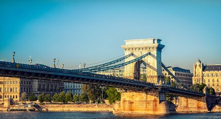 The Chain Bridge, or Lanchid, during susnet in the capital of Hungary, Budapestの写真素材