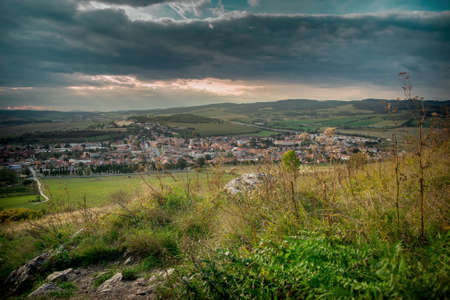 Slovakia countryside with a village in the background during sunsetの写真素材
