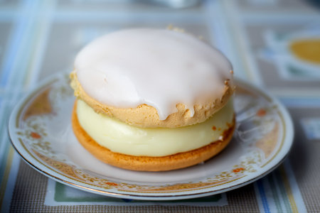 Cake with a custord filling and icing on top