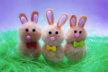 Easter bunnies in a green grass.