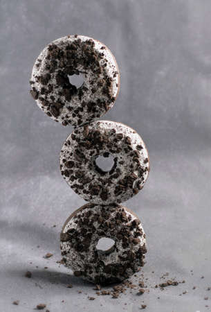 Three donuts stacked on top of each otherの写真素材