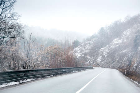 Mountain road in Slovakia at winter timeの写真素材