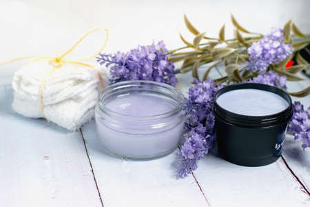 Lavender beauty products on a wooden tableの写真素材