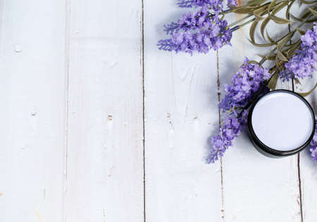 Lavender homemade beauty face mask on a wooden background.の写真素材