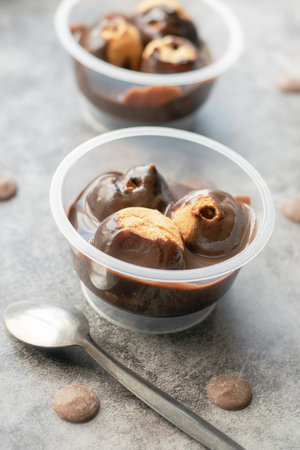Fresh profiteroles with chocolate sauce.
