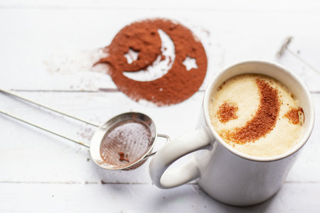 Frothy latte with moon art.の写真素材