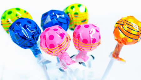 Varrious colourful lollipops on a white backgroundの写真素材