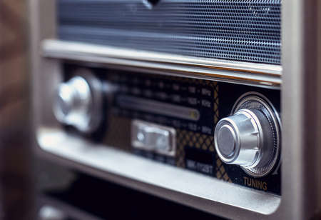 Closeup detail of a vintage style radioの写真素材