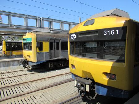 Passenger trains at a station in Lisbon, Portugalの写真素材
