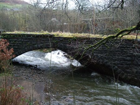 Old abandoned brick railway bridge in South Wales, UKの写真素材
