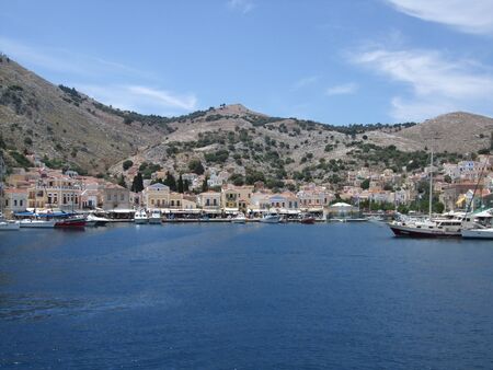 Entering the harbour on the island of Simi, Greeceの写真素材