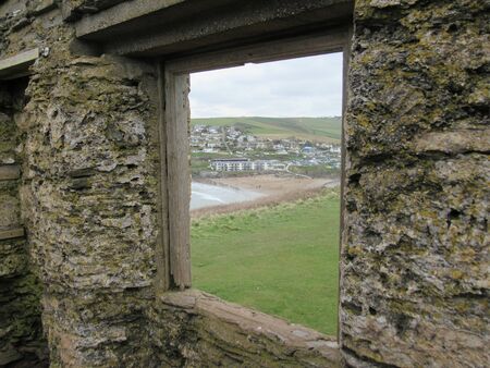 View through window of derelict house on Burgh Island, Devon UKの写真素材