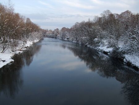 View from a bridge over a snowy River Taff, Cardiff UKの写真素材