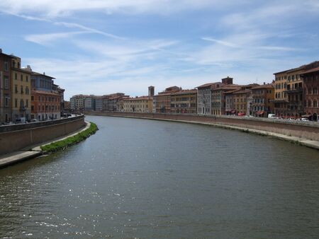 View from a bridge over the River Arno, Pisa, Italyの写真素材