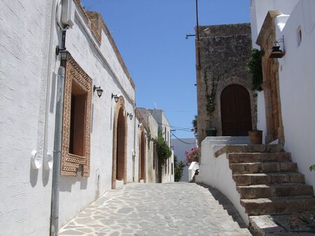 Narrow street in Lindos, Rhodesの写真素材