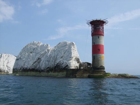 View of the Needles lighthouse from a boat. Isle of Wight UKの写真素材