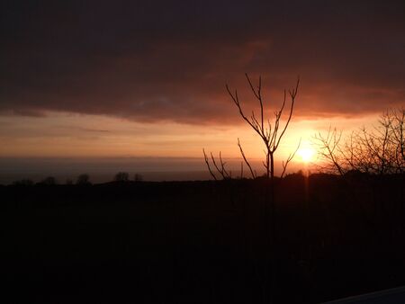 Sunset over the Bristol channel in autumn / fallの写真素材