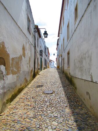 Old passage in Evora, Portugalの写真素材