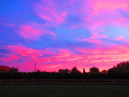 Colourful sunset with cloudsの写真素材