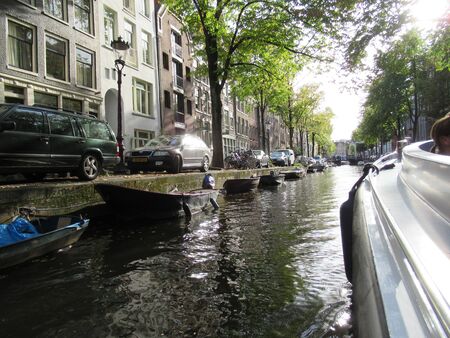 View from a boat of a canal in Amsterdam, Hollandの写真素材