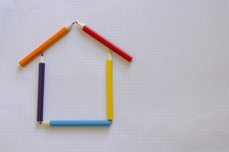 House made with colored pencils on squared paperの写真素材
