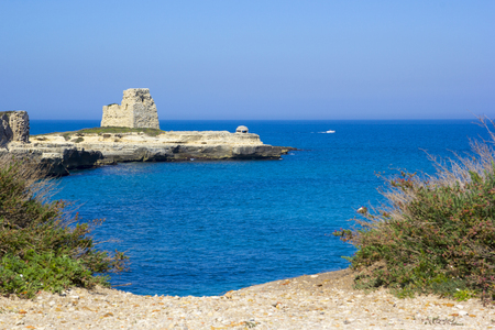 Rocky cliffs on the coast between Roca and Torre dell'Orso in Salentoの写真素材