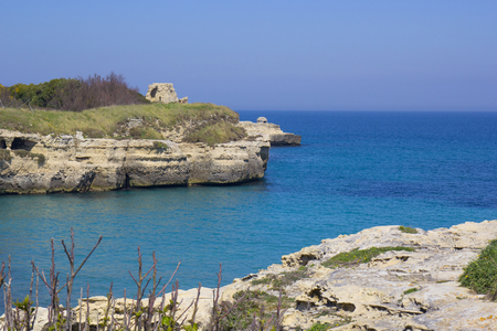 Rocky cliffs on the coast between Roca and Torre dell'Orso in Salentoの写真素材