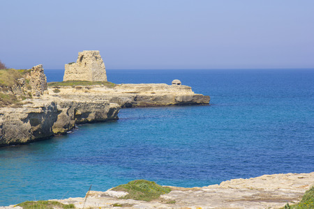 Rocky cliffs on the coast between Roca and Torre dell'Orso in Salentoの写真素材