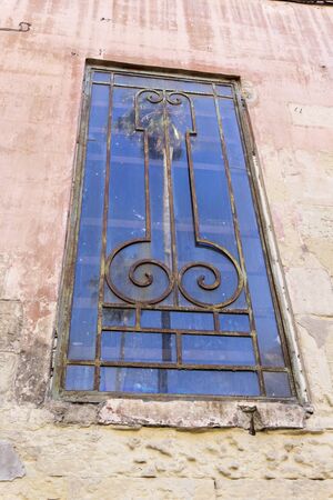 Window of an old brothel. Lecceの写真素材