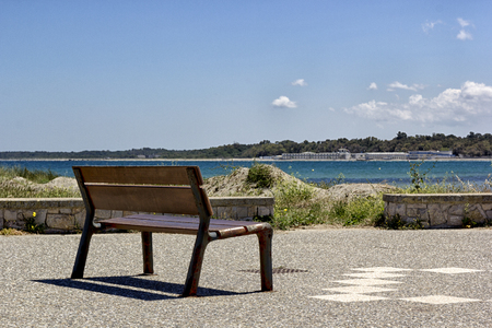 Bench facing the sea of Lecceの写真素材