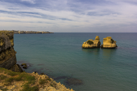 Sea of Salento: cliffs in Torre dell'Orso (Lecce, Italy)の写真素材