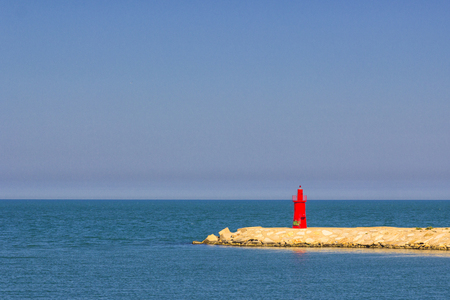 Red lighthouse of Trani, entrance to the portの写真素材