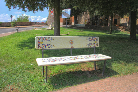 Deruta, the town of ceramics: decorated ceramic bench, entrance to the townの写真素材