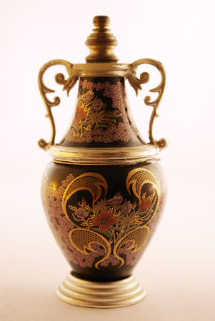 Close-up of the vintage perfume bottle on white background.の写真素材