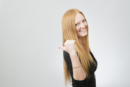 Portrait of business woman on a gray の写真素材