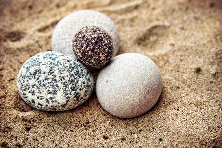 Background rocks and sand closeup. Beach.  Copy spaceの写真素材