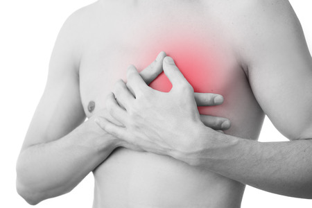 Pain in the heart of a man. Isolated on white background.の写真素材