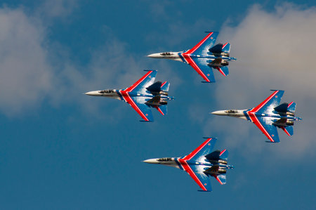 Group su-27 performing aerobatics at an airshowのeditorial素材
