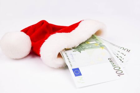 Santa hat and money. Christmas backgroundの写真素材