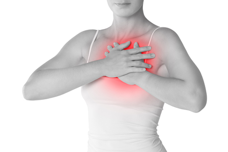 Woman's breast test, heart attack, pain in female body isolated on white background, painful area highlighted in redの写真素材