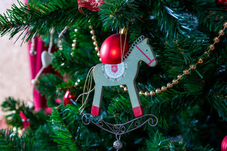 Shiny Christmas balls on pine branches, new Year decorationの写真素材