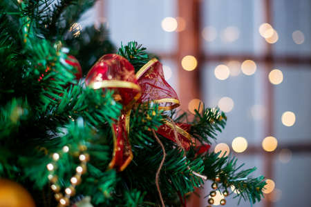 Shiny Christmas balls on pine branches, new Year decorationの写真素材