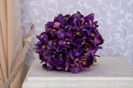 Purple wedding bouquet close-up, artificial flowersの写真素材
