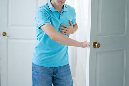 Heart attack, man with chest pain suffering at home, myocardial infarction, health problems concept