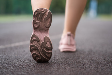 Running sneaker shoe sole closeup, morning jog, healthy lifestyleの写真素材
