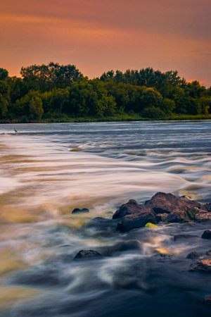 Long exposure image of Narew River in DÄbe Polandの写真素材