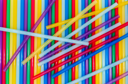 Colorful drinking straws background. Top view. Flat lay.の写真素材
