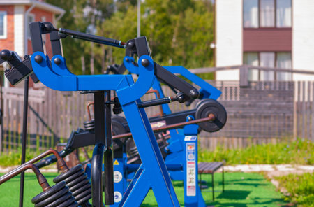 Exercise equipment in the yard of a private house in the summer